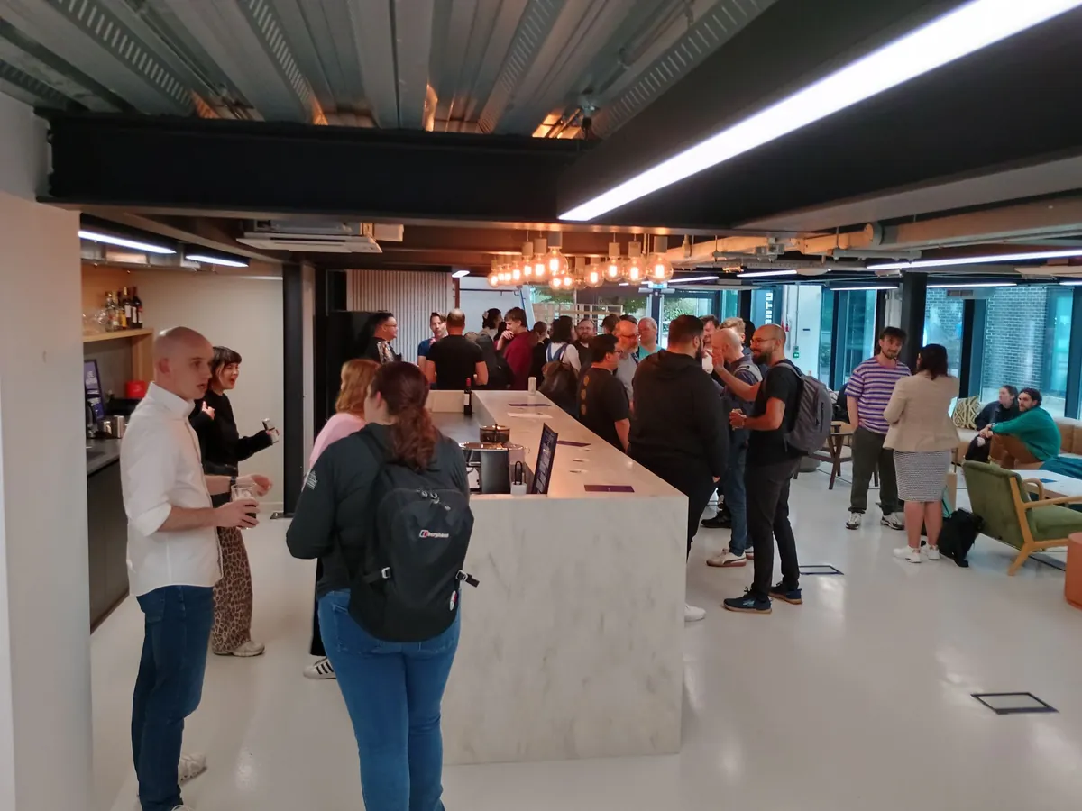 Attendees networking over drinks at a TSN event